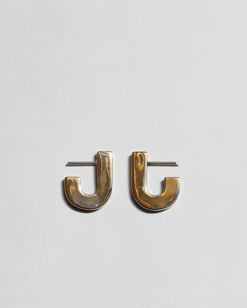 Juxta Earrings in Brass
